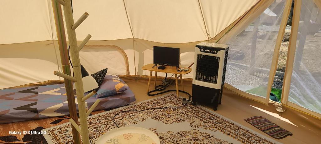 Postel nebo postele na pokoji v ubytování Arista glamcamp