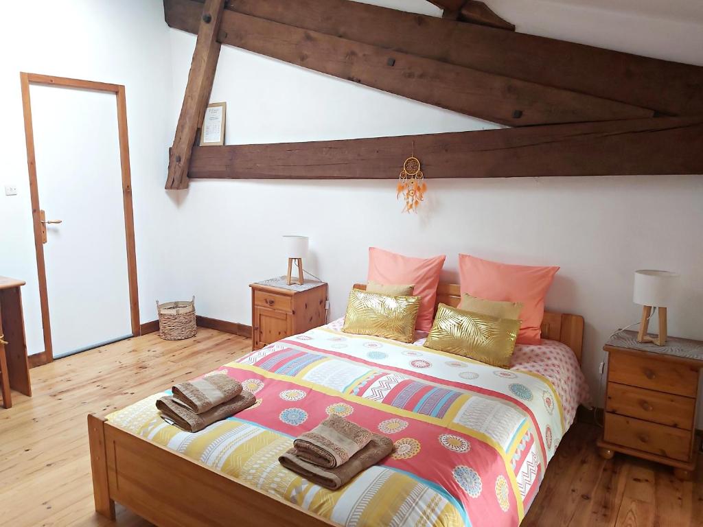 Postel nebo postele na pokoji v ubytování En Pascot - 1 appartement et 2 chambres indépendantes