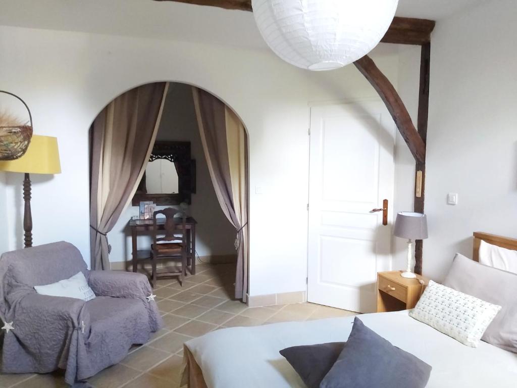 Posezení v ubytování En Pascot - 1 appartement et 2 chambres indépendantes