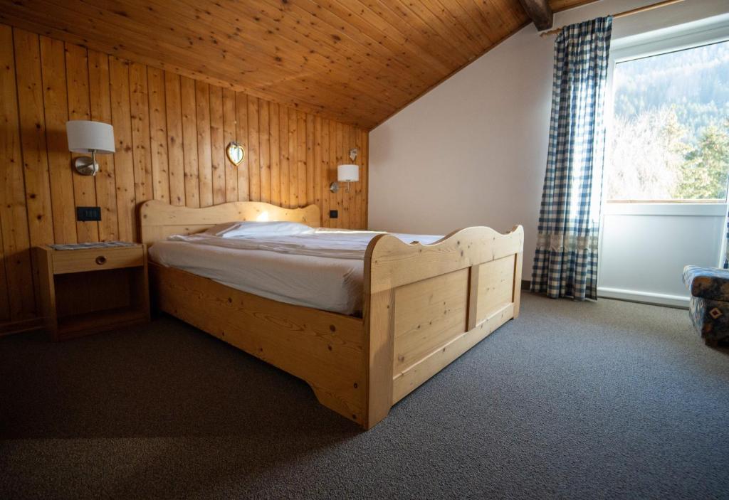 Łóżko lub łóżka w pokoju w obiekcie B&B Bucaneve