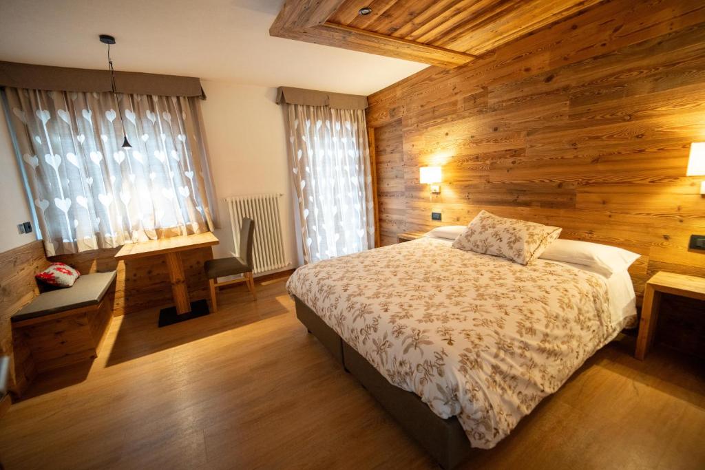 Łóżko lub łóżka w pokoju w obiekcie B&B Bucaneve