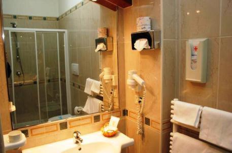Koupelna v ubytování Hotel Adria
