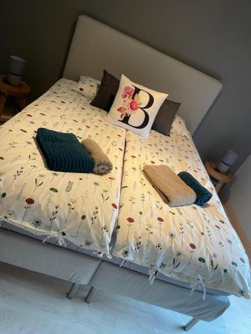 Postel nebo postele na pokoji v ubytování B&B De Notelaar