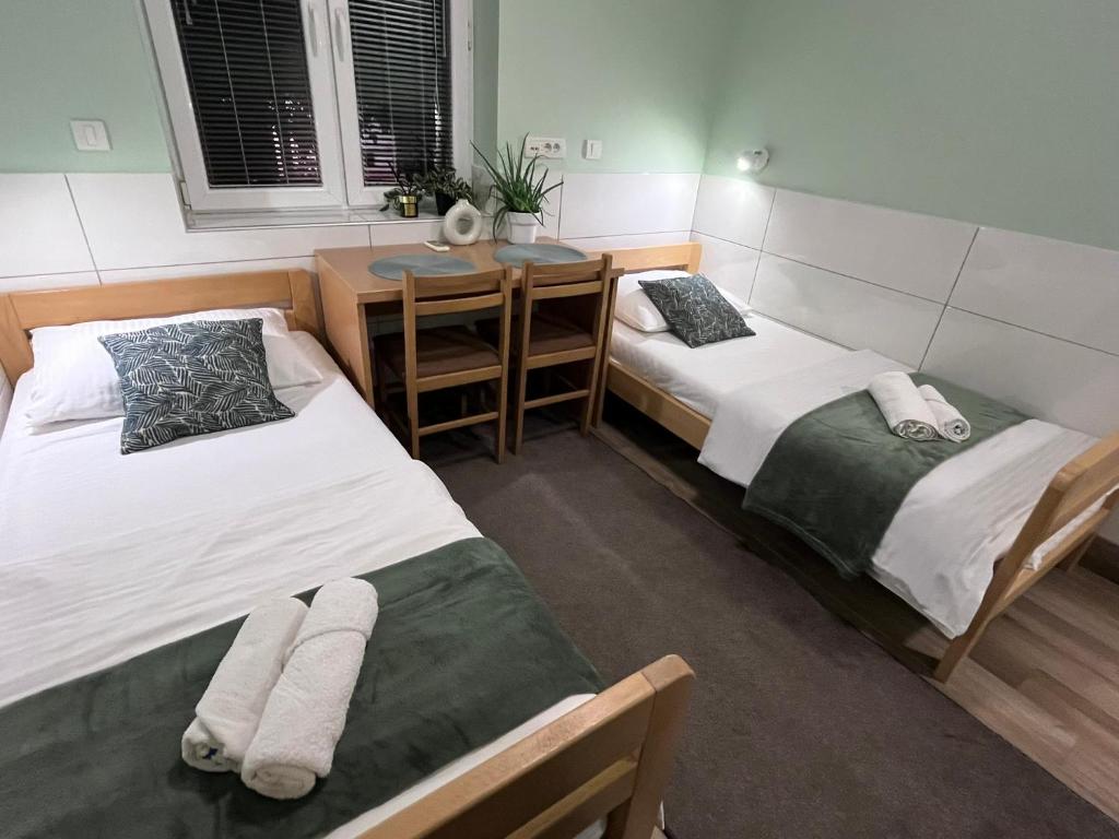 Postel nebo postele na pokoji v ubytování Flow House