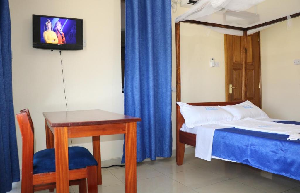 Postel nebo postele na pokoji v ubytování BMA Accommodation Centre