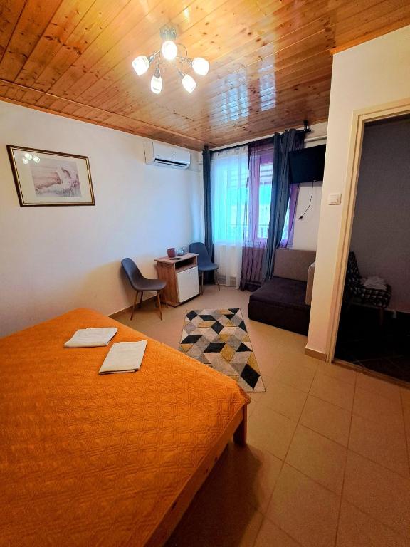 Postel nebo postele na pokoji v ubytování Csodarét Kúria
