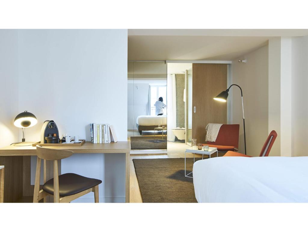 two views of a living room and a bedroom at 9Hotel Republique in Paris