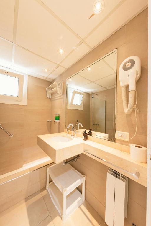 Koupelna v ubytování Le Batiment Apartmentos