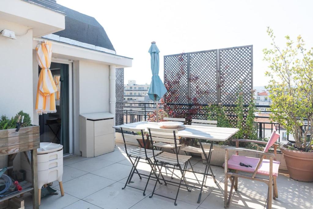 Photo de la galerie de l'établissement Bright apartment with terrace - Roland Garros, à Boulogne-Billancourt