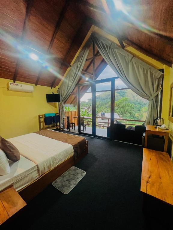 Postel nebo postele na pokoji v ubytování Ella Lovers View Cabins
