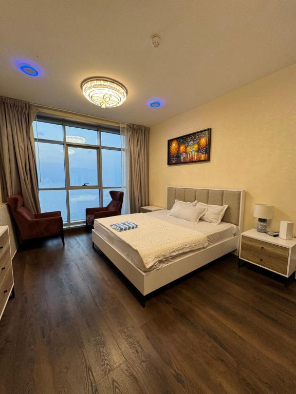 Voodi või voodid majutusasutuse Ocean View Luxury Suites toas