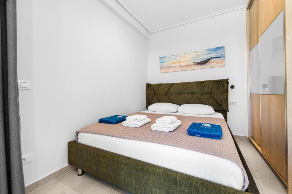 Postel nebo postele na pokoji v ubytování Vento Villas