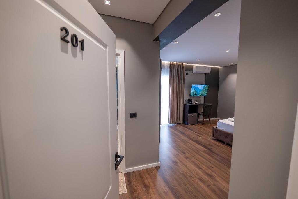 Postel nebo postele na pokoji v ubytování Erioni Hotel