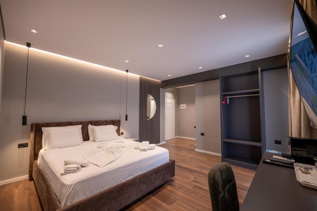 Postel nebo postele na pokoji v ubytování Erioni Hotel