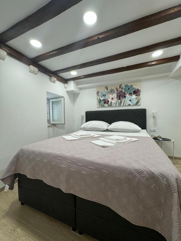 Posteľ alebo postele v izbe v ubytovaní Apartman Mama Marija