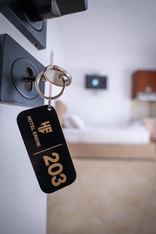 Postel nebo postele na pokoji v ubytování Erioni Hotel