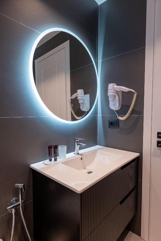 Koupelna v ubytování Erioni Hotel