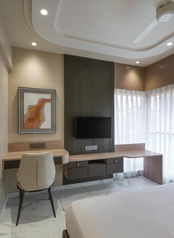 TV a/nebo společenská místnost v ubytování Orbit Serviced Apartments