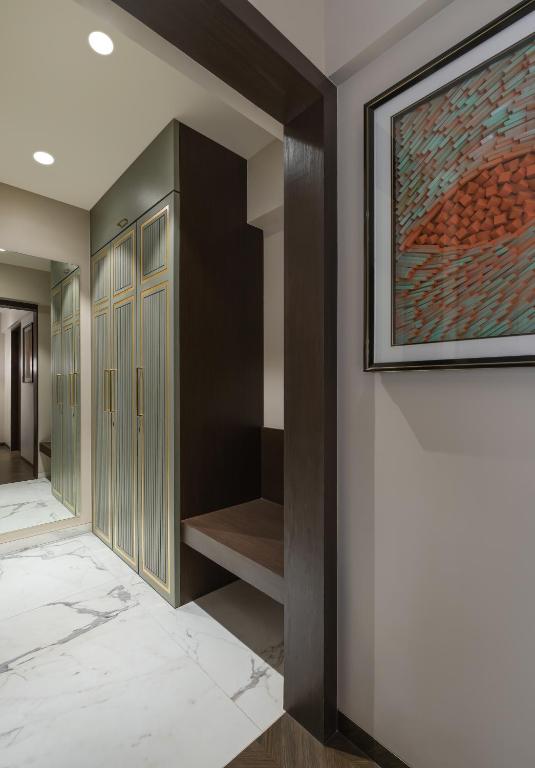 Postel nebo postele na pokoji v ubytování Orbit Serviced Apartments