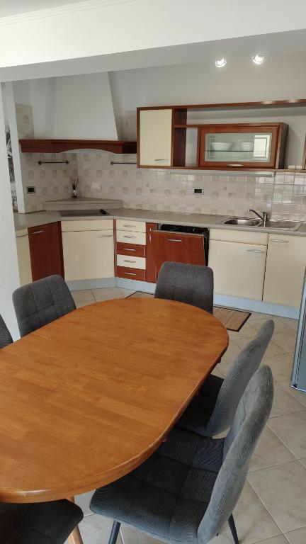 Kuchyň nebo kuchyňský kout v ubytování Apartma Apollonio