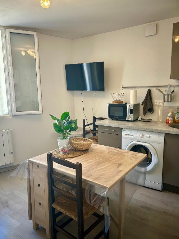 Kuchyň nebo kuchyňský kout v ubytování Appartement Résidence Beau Rivage, Ax-les-Thermes