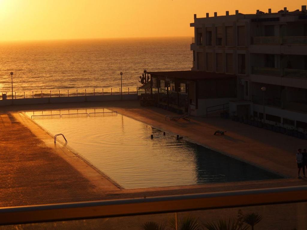 Bazén v ubytování Appart en bord de mer avec piscine vue imprenable nebo v jeho okolí