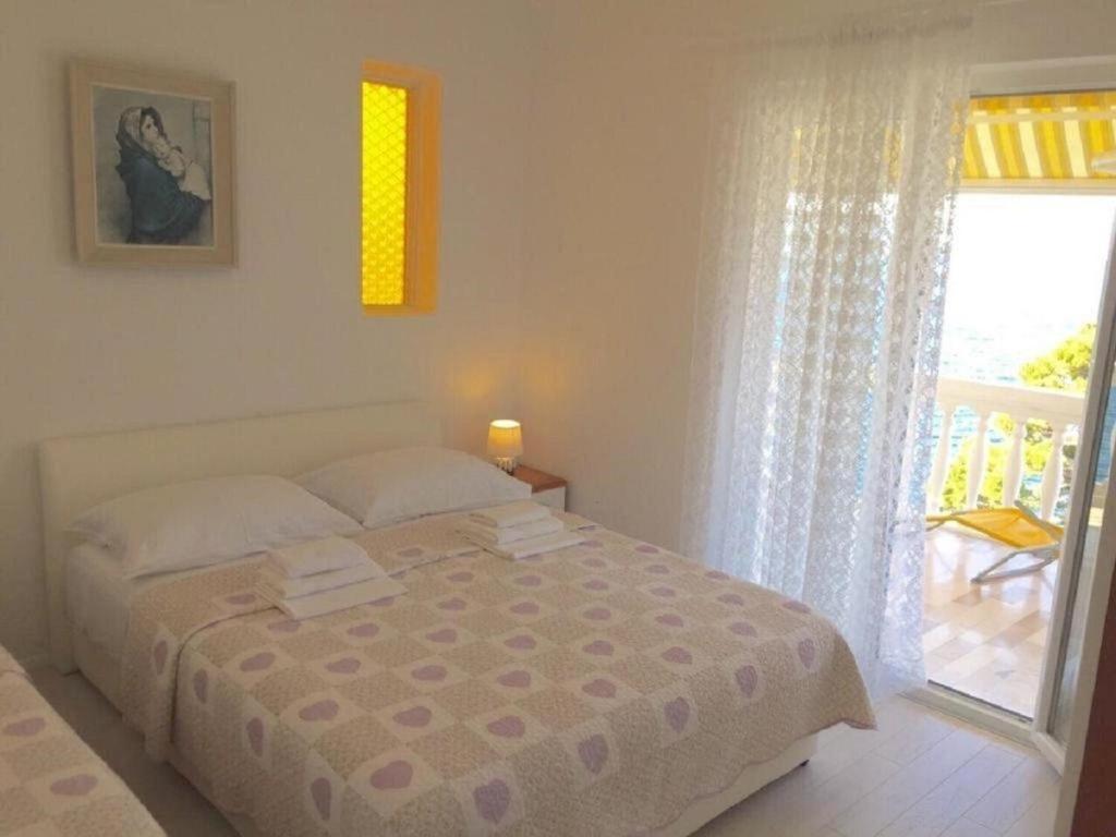 Posteľ alebo postele v izbe v ubytovaní Apartment Gojko