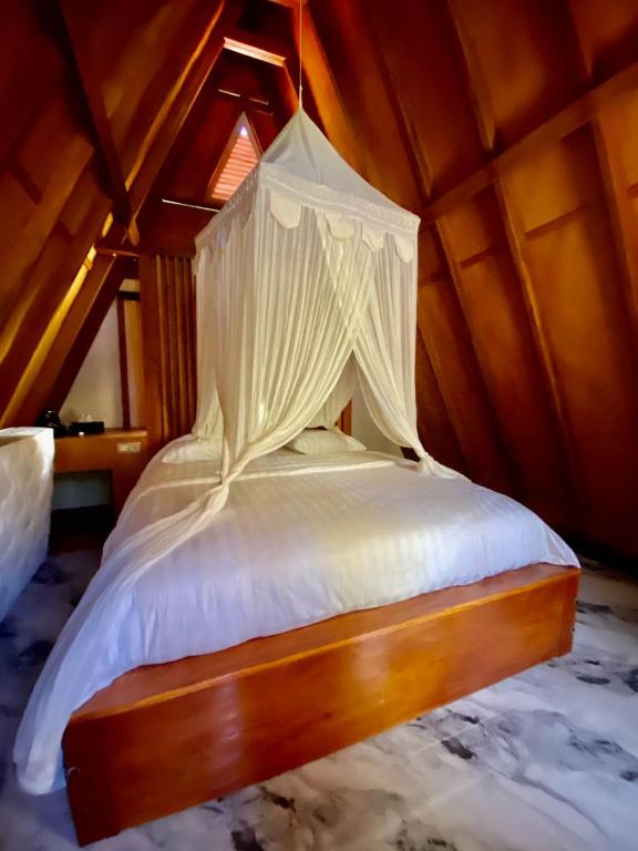 Postel nebo postele na pokoji v ubytování Villa Marcelinus
