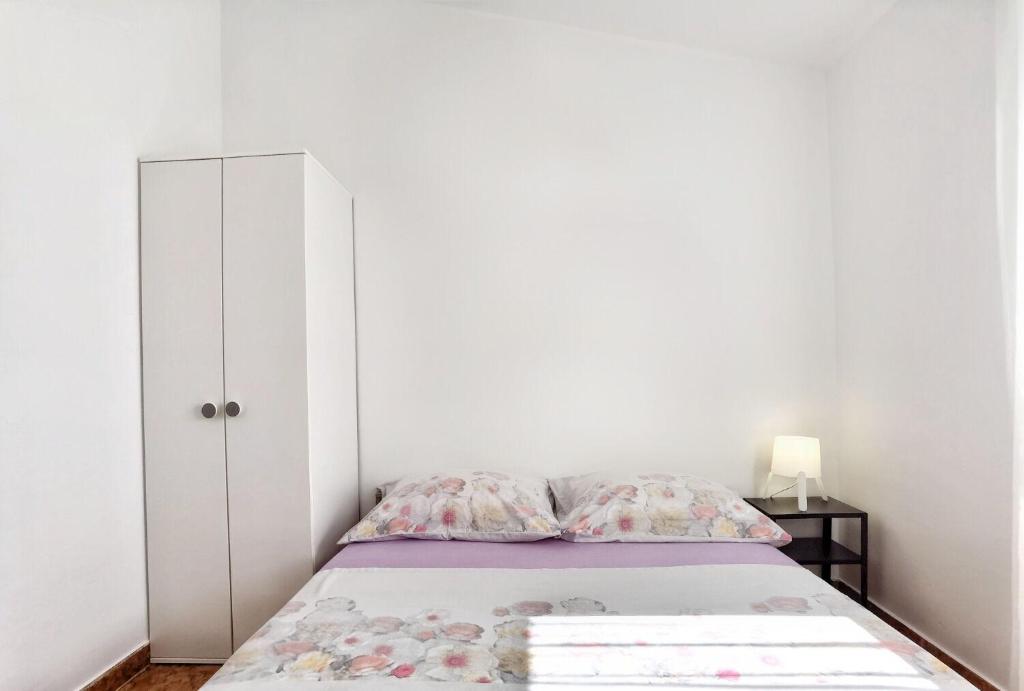 Posteľ alebo postele v izbe v ubytovaní Apartments Jera