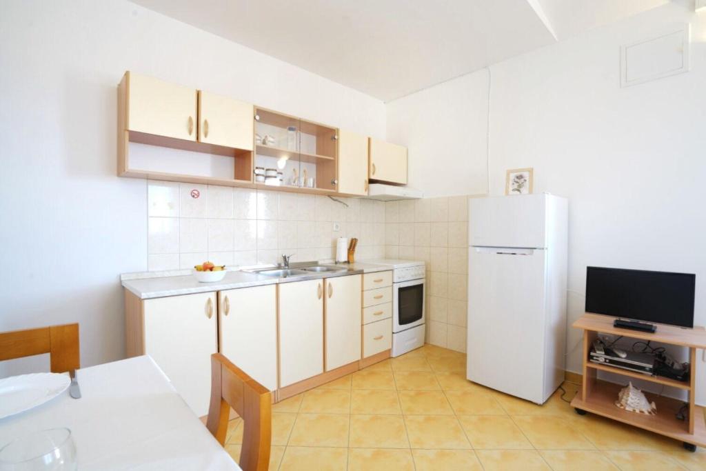 Kuchyňa alebo kuchynka v ubytovaní Apartments Jera