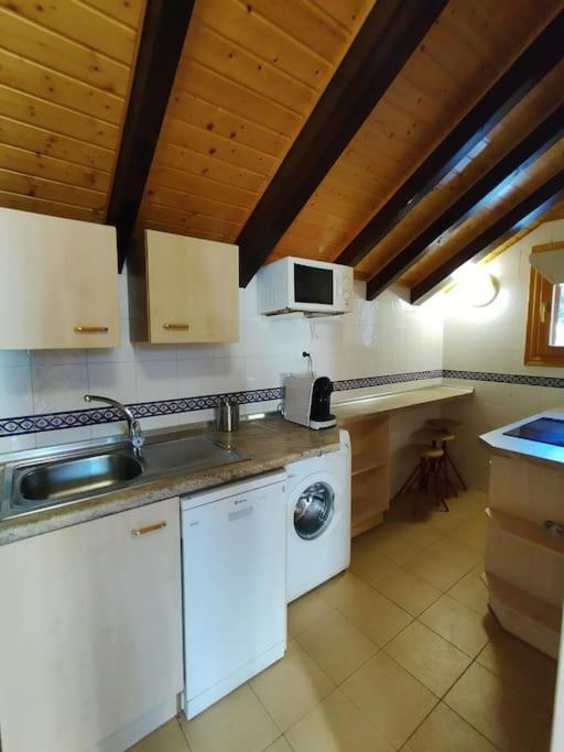 Kuchyň nebo kuchyňský kout v ubytování Misalas, Ski y montaña petfriendly - Arafita Apartamentos