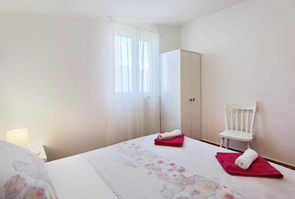 Posteľ alebo postele v izbe v ubytovaní Apartments Jera