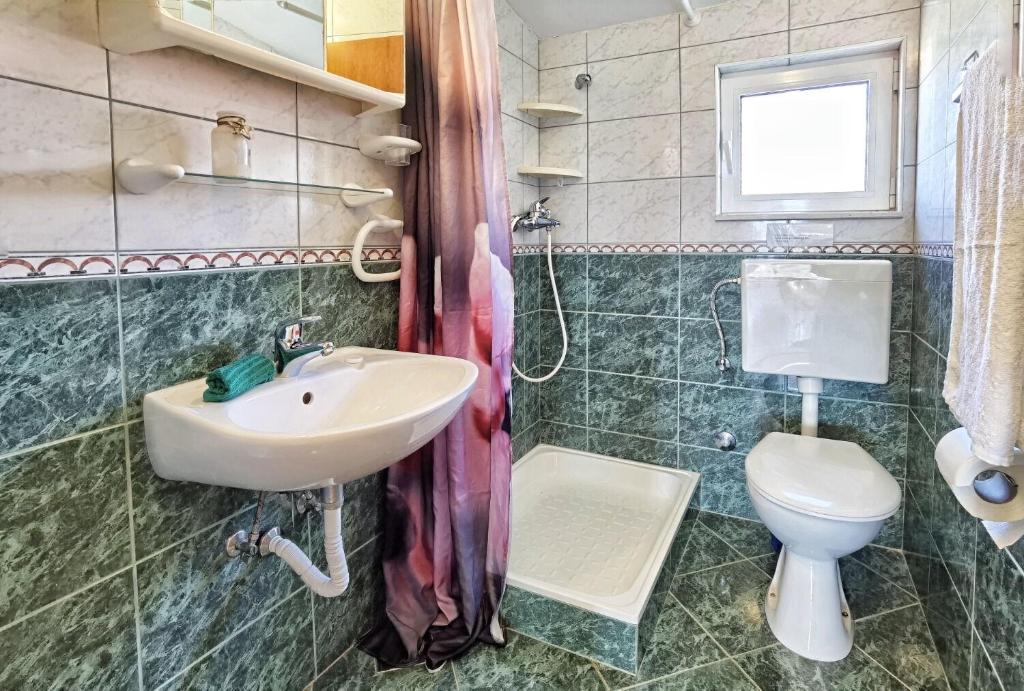 Kúpeľňa v ubytovaní Apartments Jera
