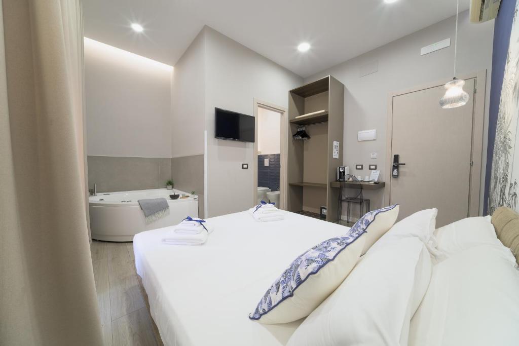 Giường trong phòng chung tại B&B Les Lumières