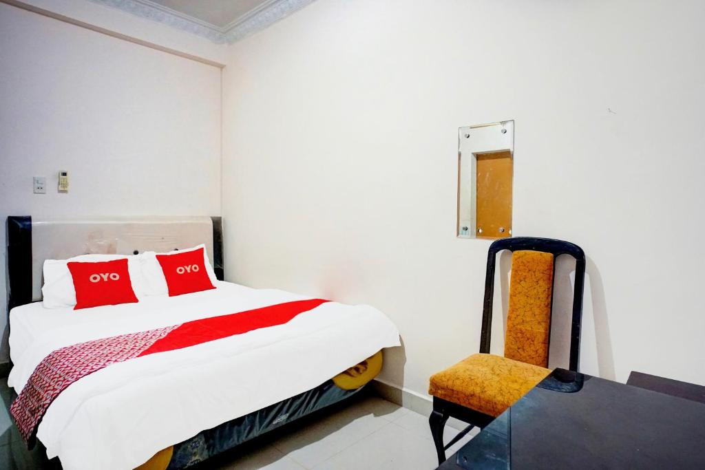 Postel nebo postele na pokoji v ubytování Hotel O Medan City Near Sun Plaza Formerly 99 Residence