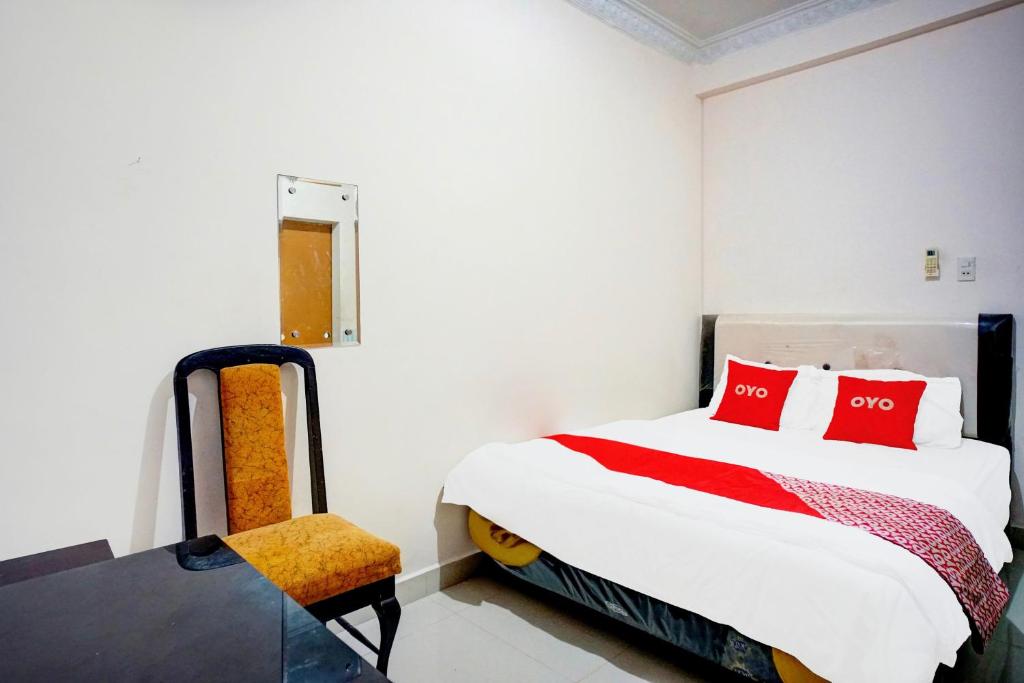 Postel nebo postele na pokoji v ubytování Hotel O Medan City Near Sun Plaza Formerly 99 Residence