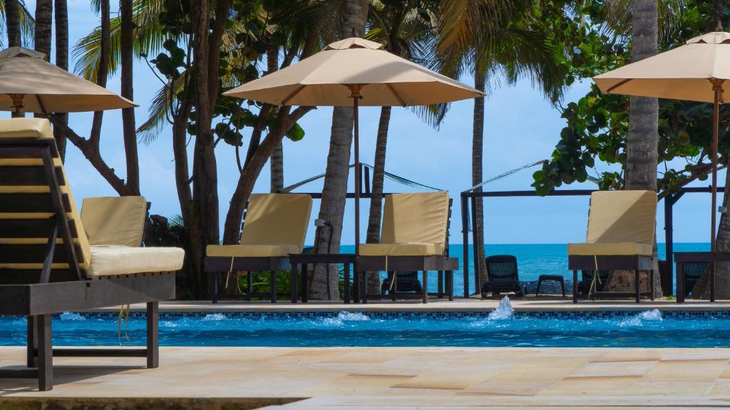 Peldbaseins naktsmītnē Coconuco Beach Palomino vai tās tuvumā