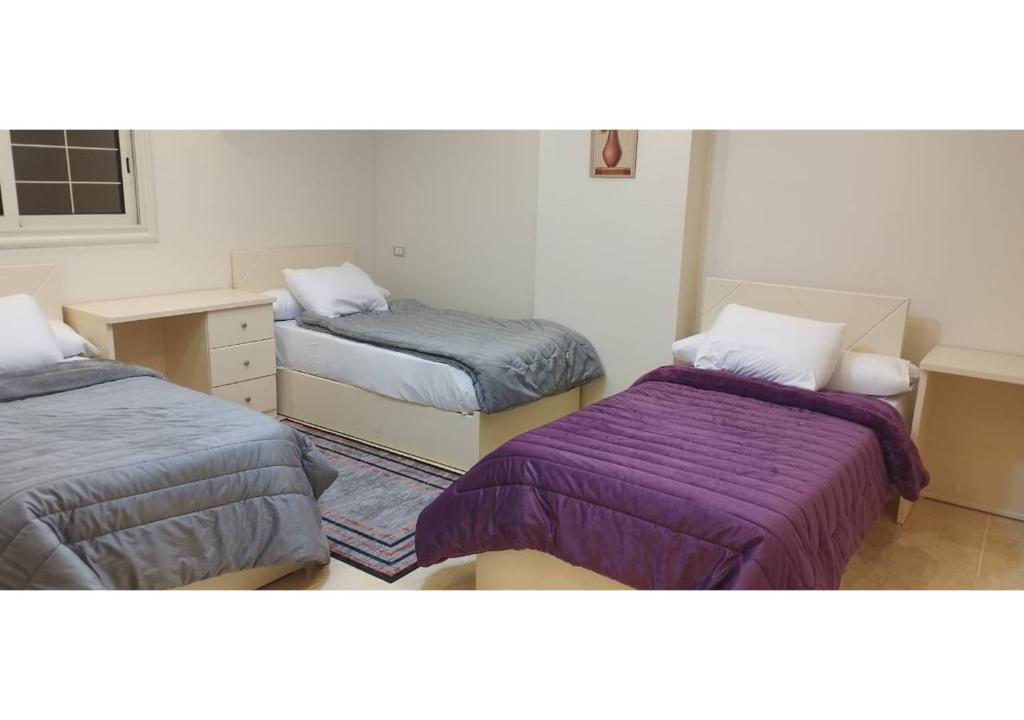 Postel nebo postele na pokoji v ubytování فندق سكن