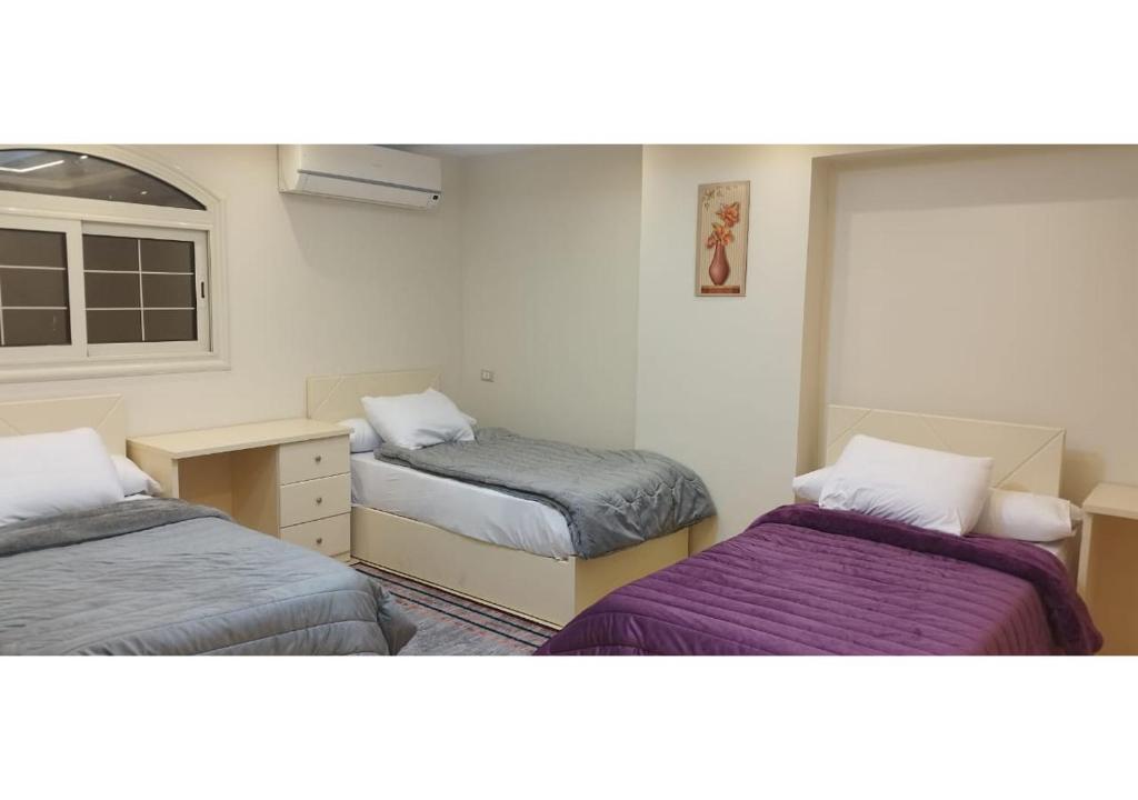 Postel nebo postele na pokoji v ubytování فندق سكن