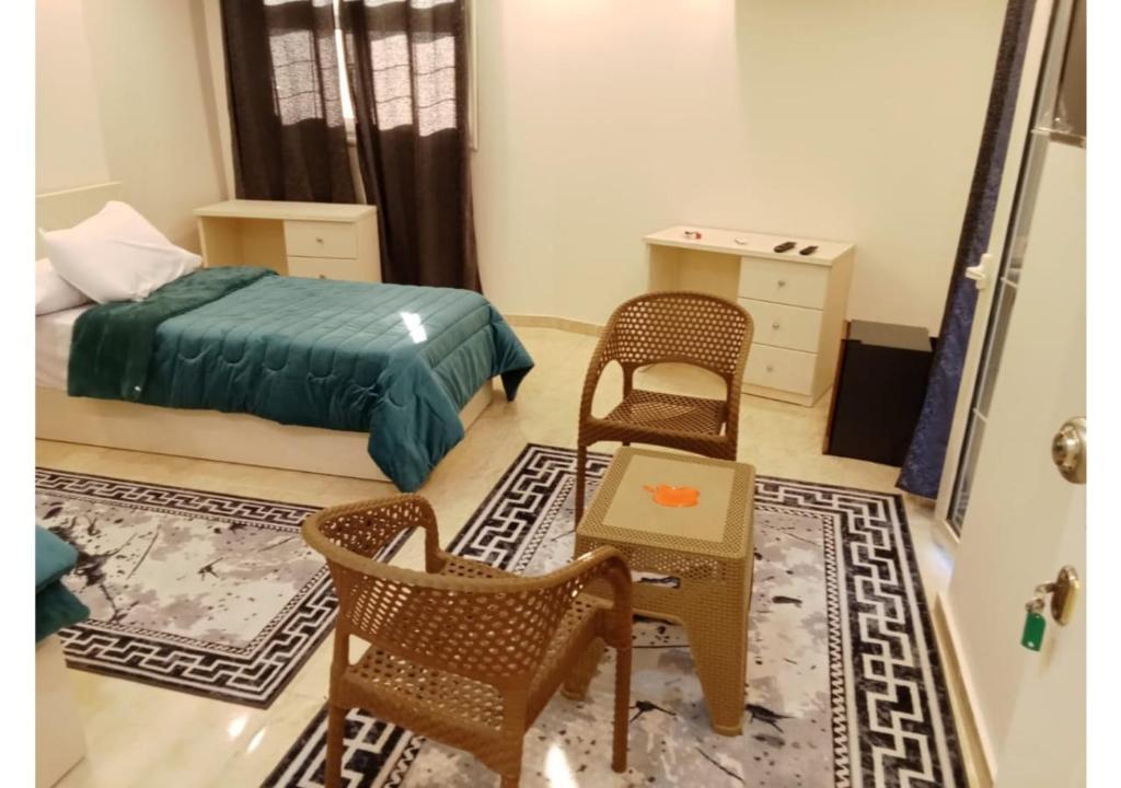 Postel nebo postele na pokoji v ubytování فندق سكن
