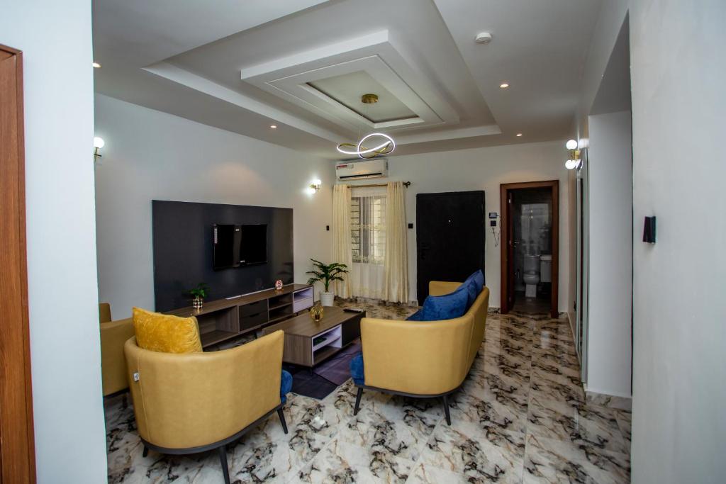 TV a/nebo společenská místnost v ubytování Aija Residences