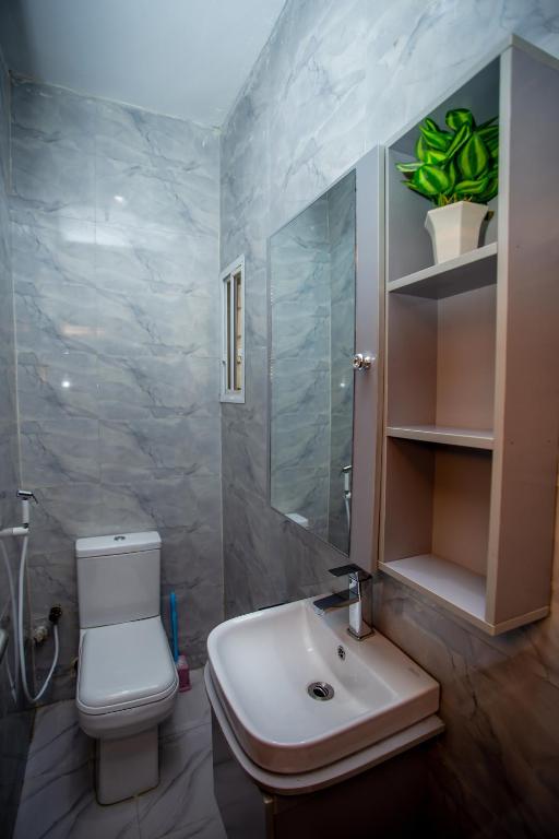 Koupelna v ubytování Aija Residences