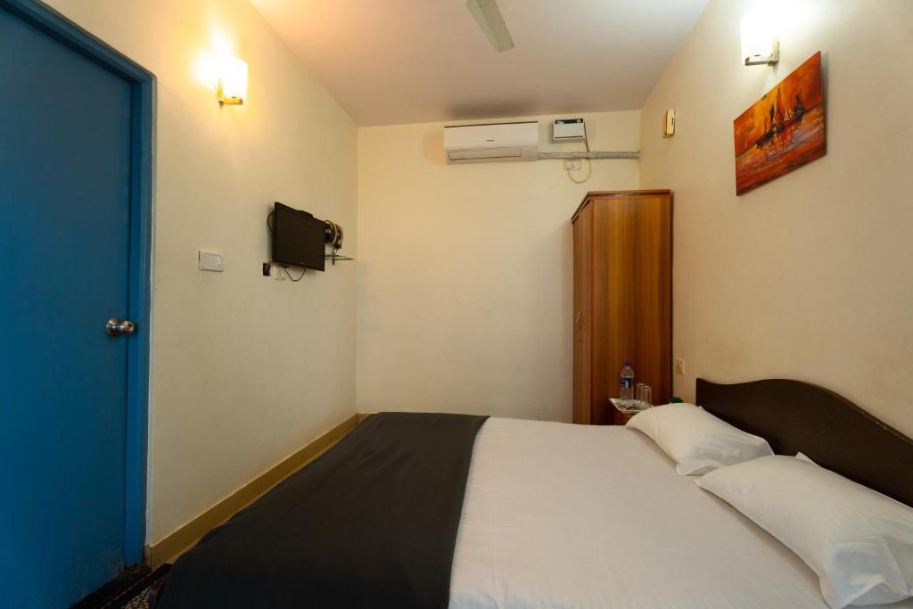 Postel nebo postele na pokoji v ubytování Gomes Pousada Guesthouse