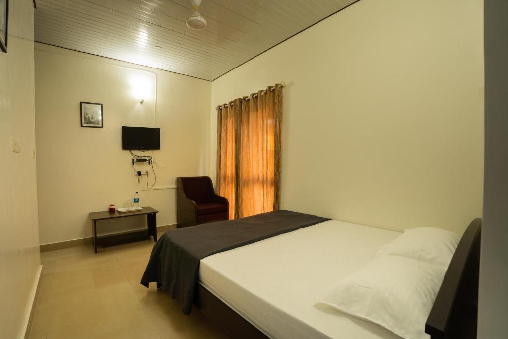 Postel nebo postele na pokoji v ubytování Gomes Pousada Guesthouse