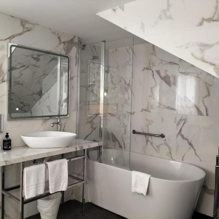 Koupelna v ubytování Hotel Clopy Rocamar