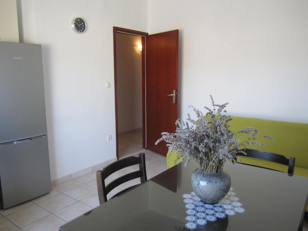 Kuchyňa alebo kuchynka v ubytovaní Apartments Deni