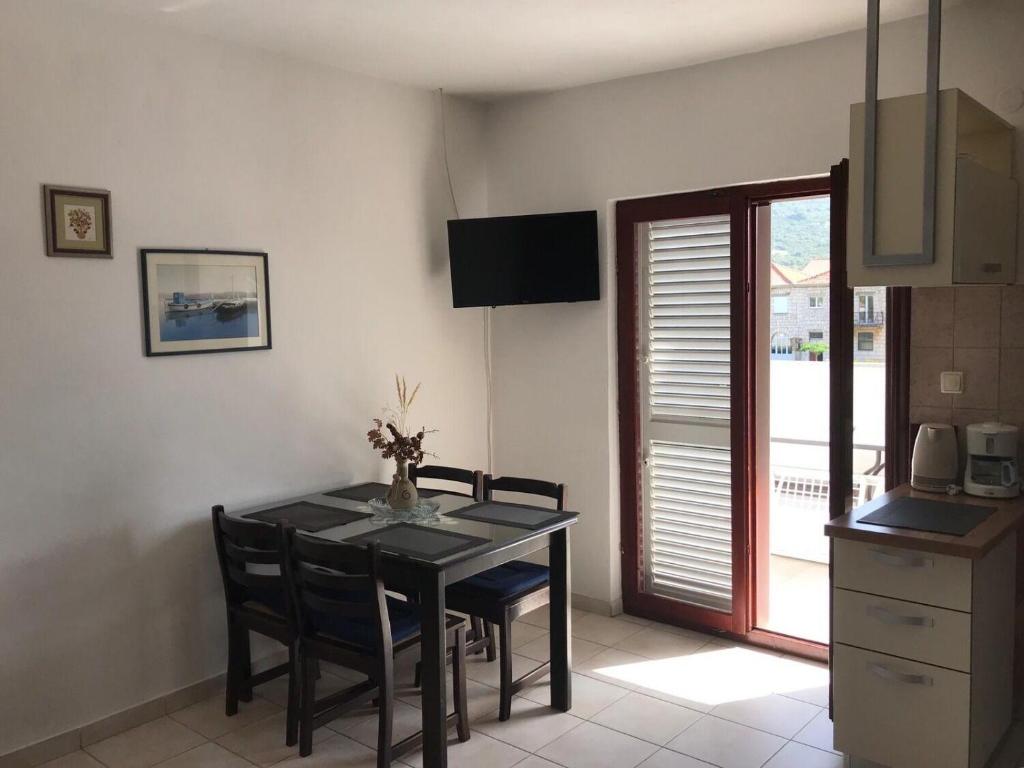 Kuchyňa alebo kuchynka v ubytovaní Apartments Deni