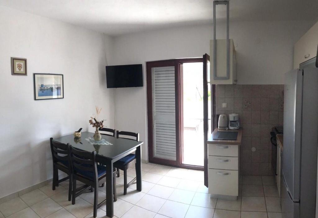 Kuchyňa alebo kuchynka v ubytovaní Apartments Deni
