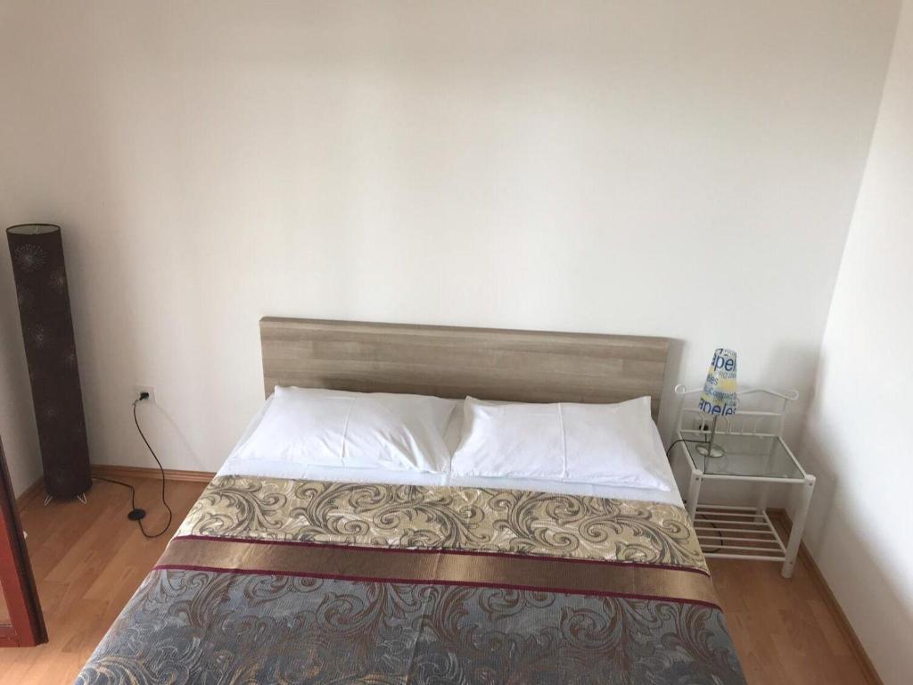 Posteľ alebo postele v izbe v ubytovaní Apartments Deni