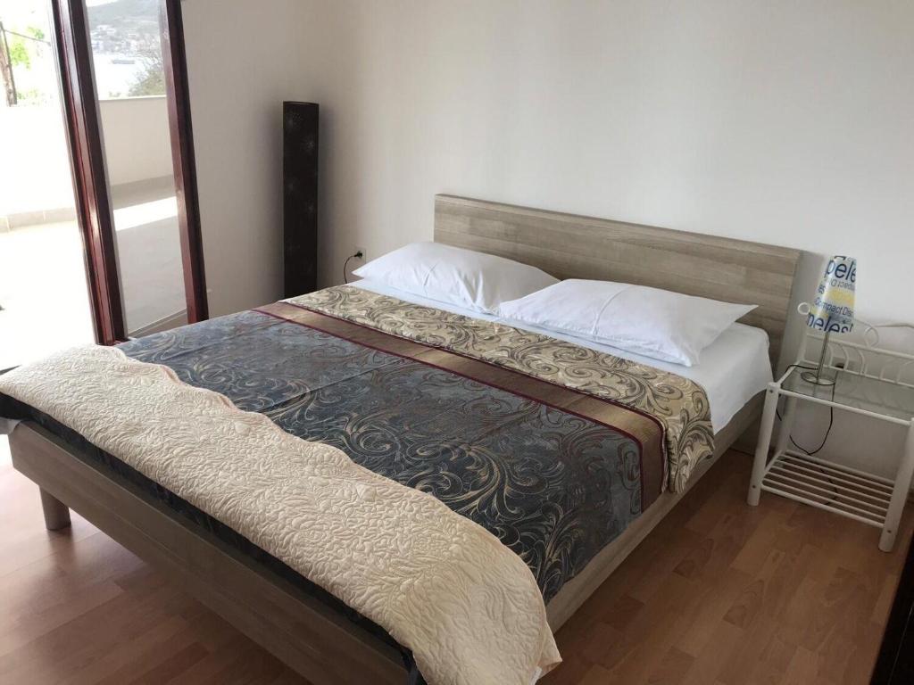 Posteľ alebo postele v izbe v ubytovaní Apartments Deni